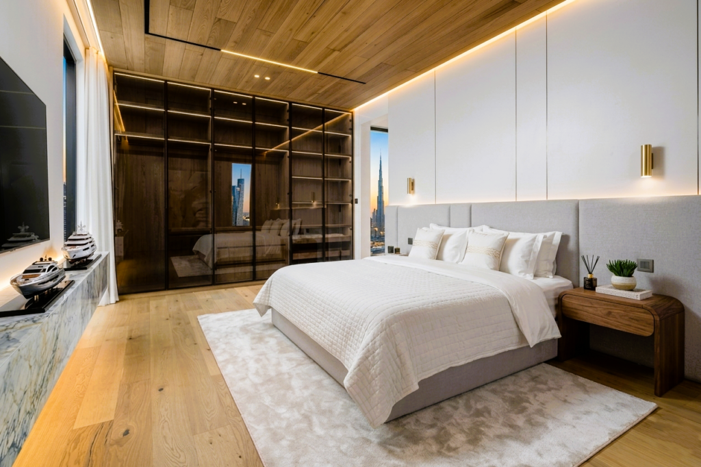Interior cladding for luxury villas in Dubai with wood panels, stone walls, and modern ceiling design