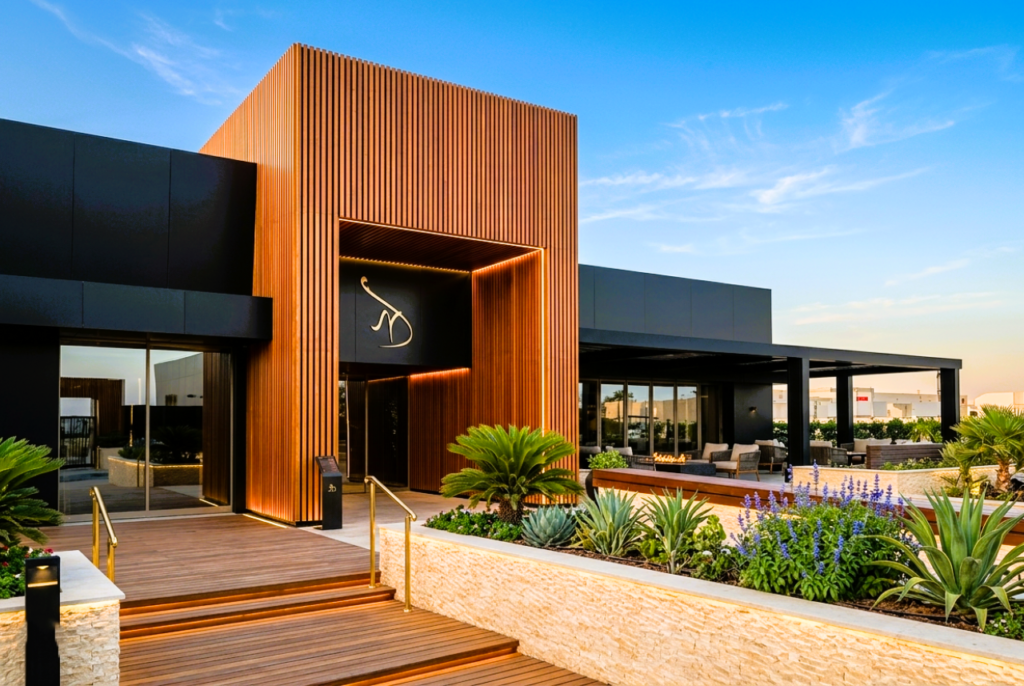 Ventilated façade cross-section showing air cavity and PARKLEX PRODEMA wood veneer cladding system