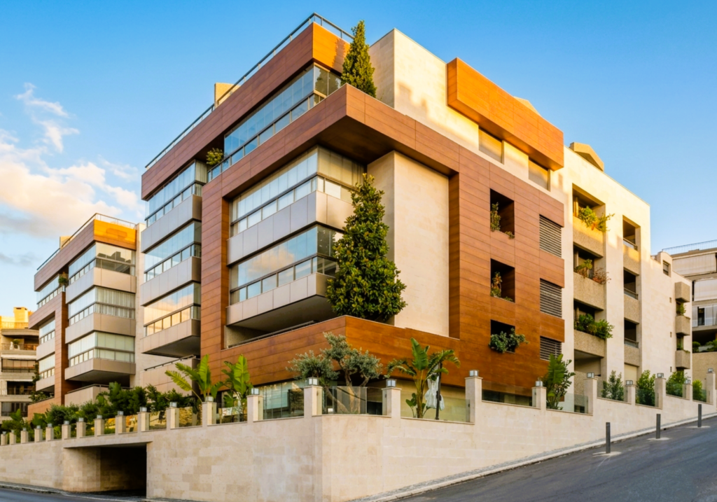 Stabilised natural wood veneer wall cladding in luxury hotel exterior — OBRAS International UAE specification